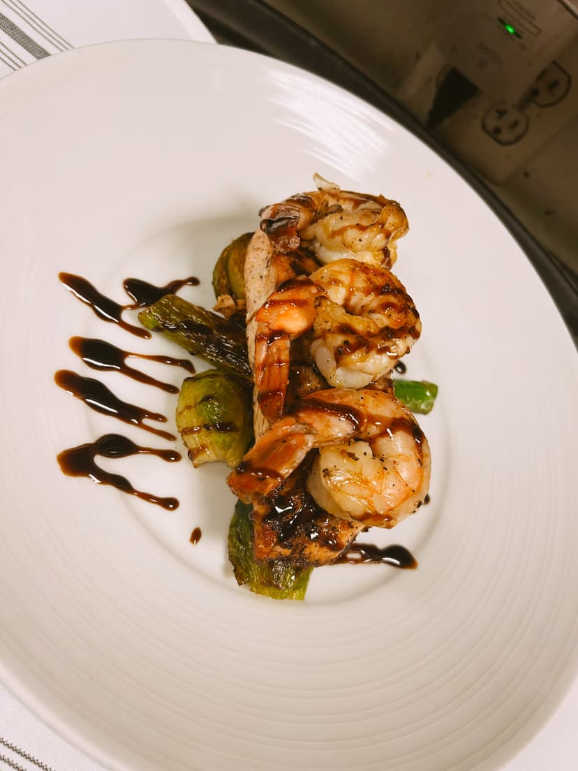 Professional kitchen staff preparing fresh Italian pasta at Mama Mia's restaurant kitchen