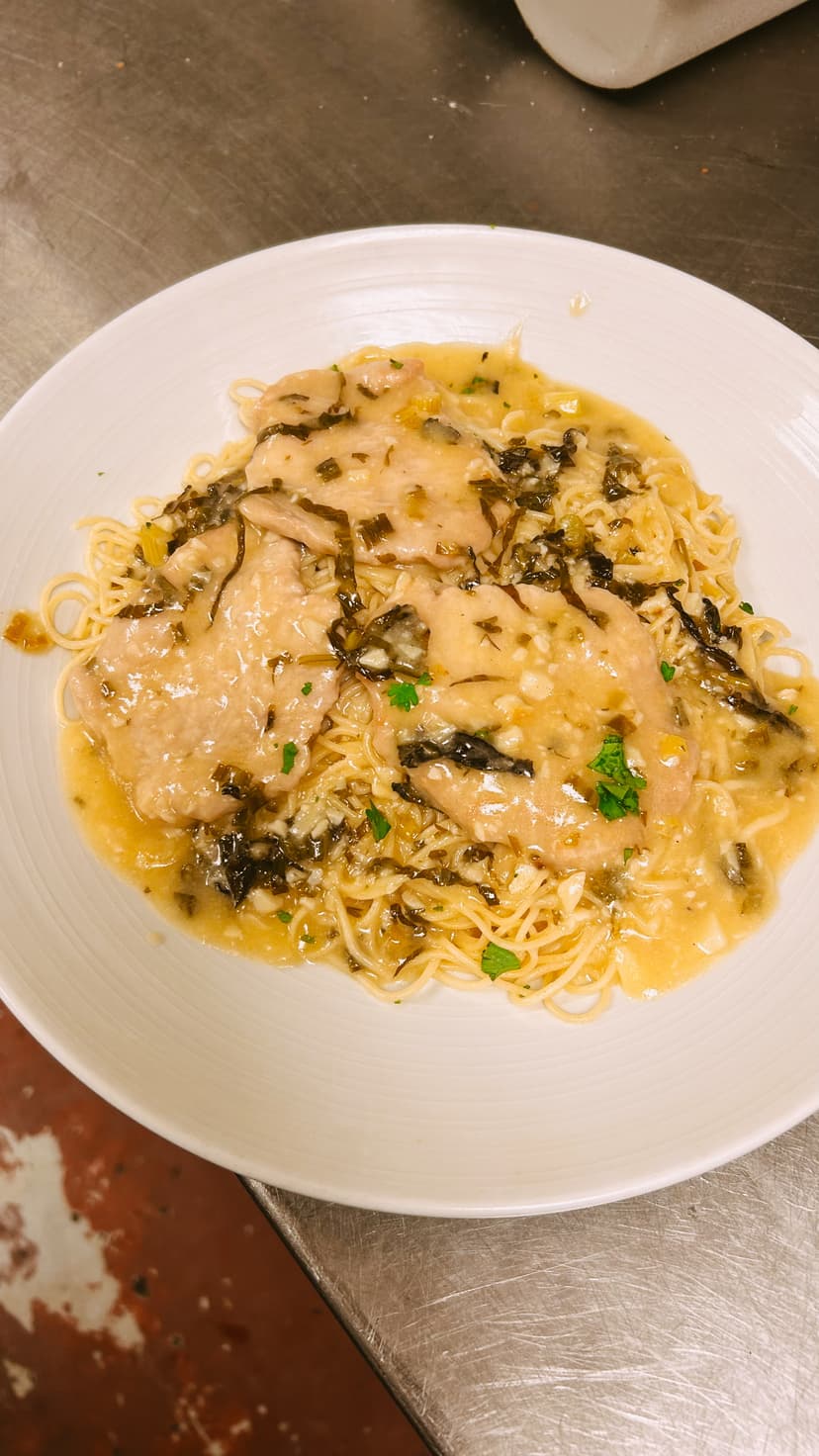 Homemade Italian gnocchi with traditional sauce prepared fresh at Mama Mia's restaurant