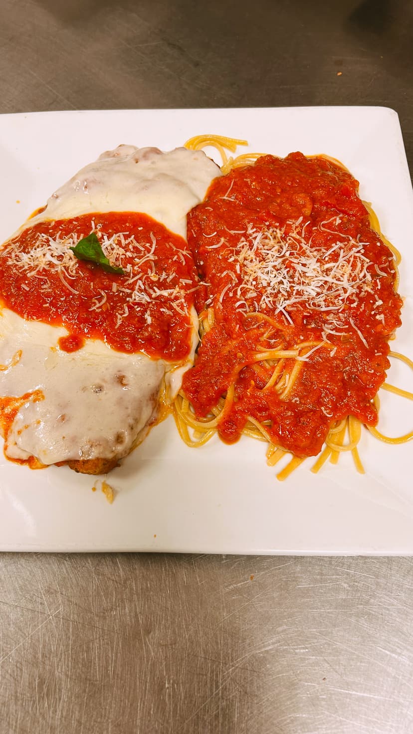 Italian wine glasses and table setting at Mama Mia's restaurant showing attention to detail